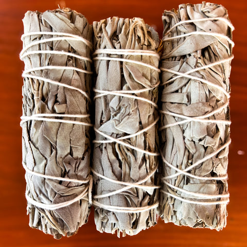 white sage smudge stick 4 inch wood background